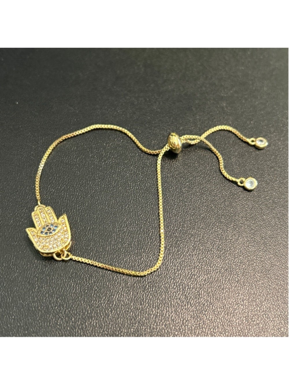 Women's Unbranded Gold Hamsa Hand Bracelet with Blue Evil Eye, adjustable to 9”